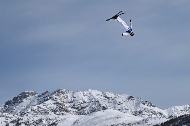China's Chen Meiting competes in the freestyle skiing women's aerials qualification 1 during the Milano Cortina 2026 Winter Olympic Games at Livigno Aerials & Moguls Park, in Livigno (Valtellina), on February 18, 2026. (Photo by Jeff PACHOUD / AFP)