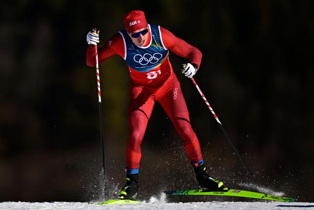 Switzerland's Janik Riebli competes during the men's team cross country free sprint qualification event of the Milano Cortina 2026 Winter Olympic Games at Tesero Cross-Country Skiing Stadium in Lago di Tesero (Val di Fiemme), on February 18, 2026. (Photo by Tobias SCHWARZ / AFP)
