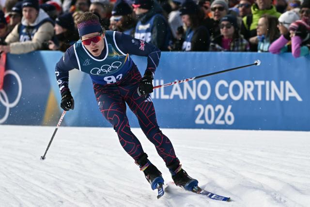 Britain's James Clugnet competes during the men's team cross country free sprint qualification event of the Milano Cortina 2026 Winter Olympic Games at Tesero Cross-Country Skiing Stadium in Lago di Tesero (Val di Fiemme), on February 18, 2026. (Photo by Javier SORIANO / AFP)