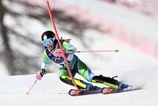 Slovenia's Ana Bucik Jogan competes in the first run of the women's slalom event during the Milano Cortina 2026 Winter Olympic Games at the Tofane Alpine Skiing Centre in Cortina d’Ampezzo on February 18, 2026. (Photo by Tiziana FABI / AFP)