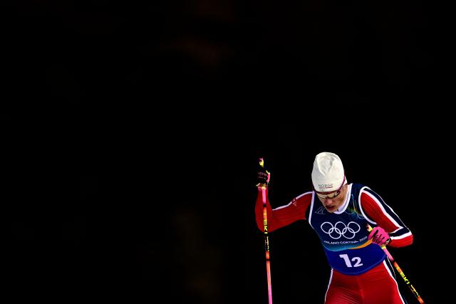 Norway's Johannes Hoesflot Klaebo competes during the men's team cross country free sprint qualification event of the Milano Cortina 2026 Winter Olympic Games at Tesero Cross-Country Skiing Stadium in Lago di Tesero (Val di Fiemme), on February 18, 2026. (Photo by Tobias SCHWARZ / AFP)