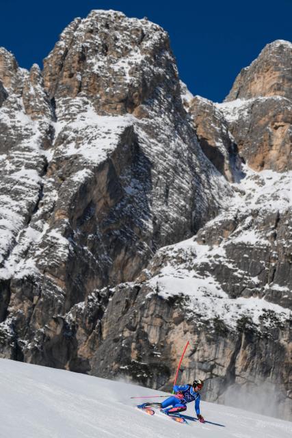 Italy's Anna Trocker competes in the first run of the women's slalom event during the Milano Cortina 2026 Winter Olympic Games at the Tofane Alpine Skiing Centre in Cortina d’Ampezzo on February 18, 2026. (Photo by Marco BERTORELLO / AFP)