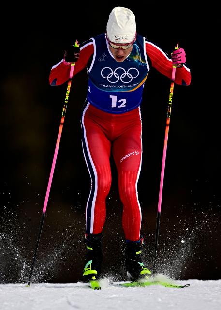 Norway's Johannes Hoesflot Klaebo competes during the men's team cross country free sprint qualification event of the Milano Cortina 2026 Winter Olympic Games at Tesero Cross-Country Skiing Stadium in Lago di Tesero (Val di Fiemme), on February 18, 2026. (Photo by Tobias SCHWARZ / AFP)