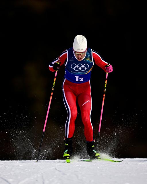 Norway's Johannes Hoesflot Klaebo competes during the men's team cross country free sprint qualification event of the Milano Cortina 2026 Winter Olympic Games at Tesero Cross-Country Skiing Stadium in Lago di Tesero (Val di Fiemme), on February 18, 2026. (Photo by Tobias SCHWARZ / AFP)