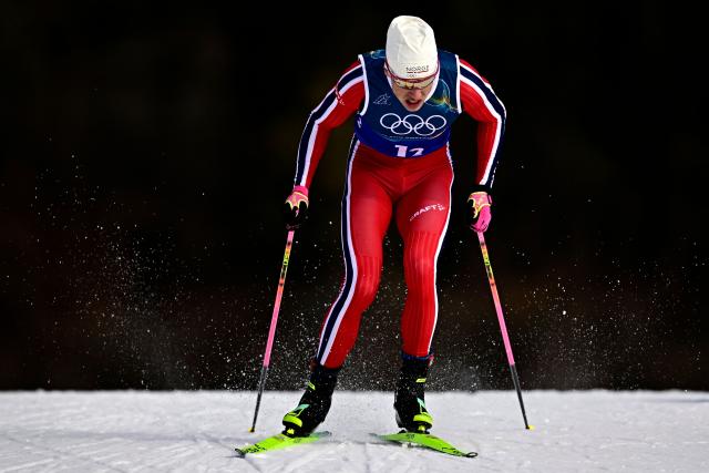 Norway's Johannes Hoesflot Klaebo competes during the men's team cross country free sprint qualification event of the Milano Cortina 2026 Winter Olympic Games at Tesero Cross-Country Skiing Stadium in Lago di Tesero (Val di Fiemme), on February 18, 2026. (Photo by Tobias SCHWARZ / AFP)