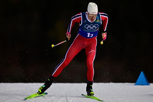 Norway's Johannes Hoesflot Klaebo competes during the men's team cross country free sprint qualification event of the Milano Cortina 2026 Winter Olympic Games at Tesero Cross-Country Skiing Stadium in Lago di Tesero (Val di Fiemme), on February 18, 2026. (Photo by Tobias SCHWARZ / AFP)