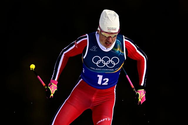 Norway's Johannes Hoesflot Klaebo competes during the men's team cross country free sprint qualification event of the Milano Cortina 2026 Winter Olympic Games at Tesero Cross-Country Skiing Stadium in Lago di Tesero (Val di Fiemme), on February 18, 2026. (Photo by Tobias SCHWARZ / AFP)