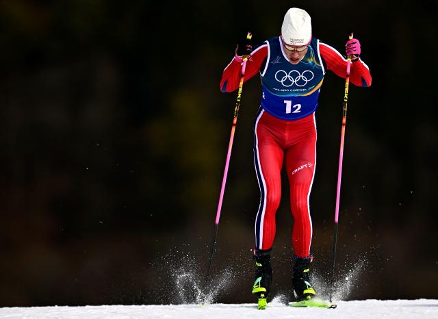 Norway's Johannes Hoesflot Klaebo competes during the men's team cross country free sprint qualification event of the Milano Cortina 2026 Winter Olympic Games at Tesero Cross-Country Skiing Stadium in Lago di Tesero (Val di Fiemme), on February 18, 2026. (Photo by Tobias SCHWARZ / AFP)