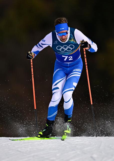 Finland's Joni Maki competes during the men's team cross country free sprint qualification event of the Milano Cortina 2026 Winter Olympic Games at Tesero Cross-Country Skiing Stadium in Lago di Tesero (Val di Fiemme), on February 18, 2026. (Photo by Tobias SCHWARZ / AFP)