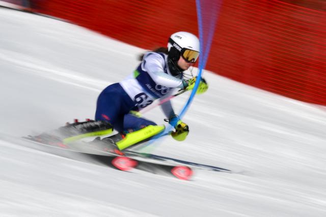 Bulgaria's Anina Zurbriggen competes in the first run of the women's slalom event during the Milano Cortina 2026 Winter Olympic Games at the Tofane Alpine Skiing Centre in Cortina d’Ampezzo on February 18, 2026. (Photo by Marco BERTORELLO / AFP)