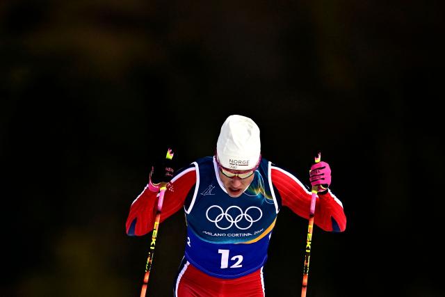 Norway's Johannes Hoesflot Klaebo competes during the men's team cross country free sprint qualification event of the Milano Cortina 2026 Winter Olympic Games at Tesero Cross-Country Skiing Stadium in Lago di Tesero (Val di Fiemme), on February 18, 2026. (Photo by Tobias SCHWARZ / AFP)