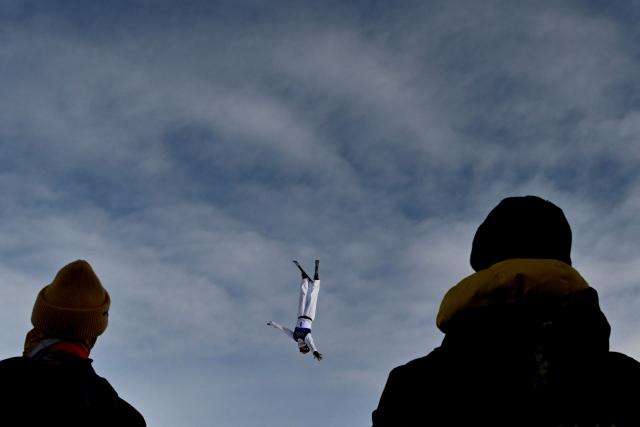 China's Xu Mengtao competes in the freestyle skiing women's aerials qualification 1 during the Milano Cortina 2026 Winter Olympic Games at Livigno Aerials & Moguls Park, in Livigno (Valtellina), on February 18, 2026. (Photo by Jeff PACHOUD / AFP)
