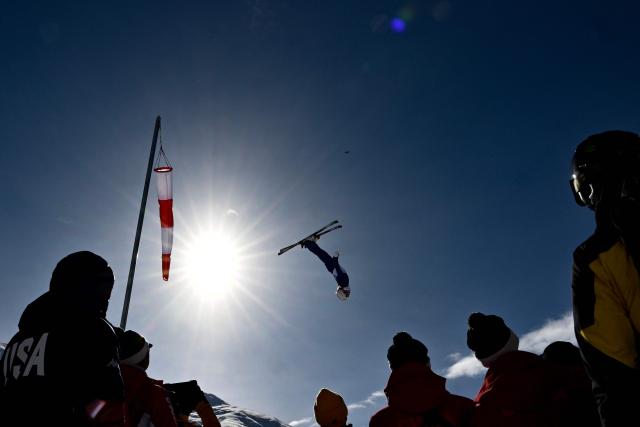 Individual Neutral Athletes' Hanna Huskova competes in the freestyle skiing women's aerials qualification 2 during the Milano Cortina 2026 Winter Olympic Games at Livigno Aerials & Moguls Park, in Livigno (Valtellina), on February 18, 2026. (Photo by Jeff PACHOUD / AFP)