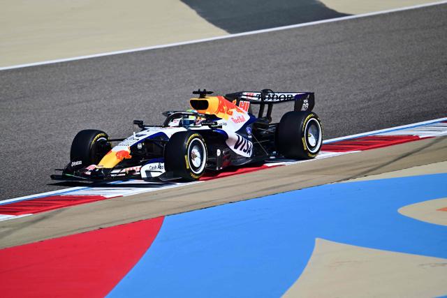 RB's British driver Arvid Lindblad drives on the first day of the Formula One pre-season testing at the Bahrain International Circuit in Sakhir on February 18, 2026.  (Photo by Giuseppe CACACE / AFP)
