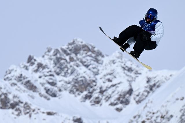 Norway's Marcus Kleveland competes in the snowboard men's slopestyle final run 1 during the Milano Cortina 2026 Winter Olympic Games at Livigno Snow Park, in Livigno (Valtellina), on February 18, 2026. (Photo by Kirill KUDRYAVTSEV / AFP)