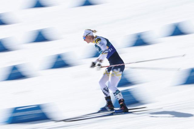 Sweden's Maja Dahlqvist competes during the women's team cross country free sprint final event of the Milano Cortina 2026 Winter Olympic Games at Tesero Cross-Country Skiing Stadium in Lago di Tesero (Val di Fiemme), on February 18, 2026. (Photo by Anne-Christine POUJOULAT / AFP)