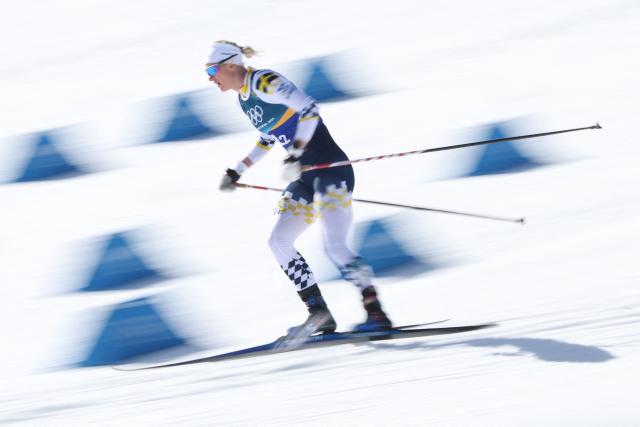 Sweden's Maja Dahlqvist competes during the women's team cross country free sprint final event of the Milano Cortina 2026 Winter Olympic Games at Tesero Cross-Country Skiing Stadium in Lago di Tesero (Val di Fiemme), on February 18, 2026. (Photo by Anne-Christine POUJOULAT / AFP)