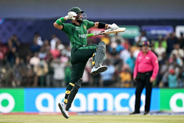 Pakistan's Sahibzada Farhan celebrates after scoring a century (100 runs) during the 2026 ICC Men's T20 Cricket World Cup group stage match between Pakistan and Namibia at the Sinhalese Sports Club (SSC) Ground in Colombo on February 18, 2026. (Photo by Ishara S. KODIKARA / AFP)