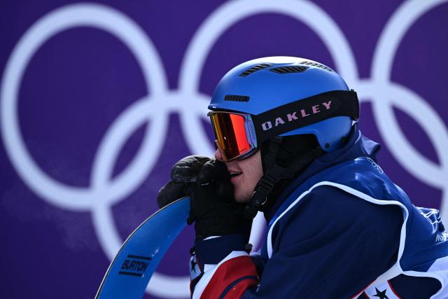 USA's Jake Canter waits for his score after competing in the snowboard men's slopestyle final run 2 during the Milano Cortina 2026 Winter Olympic Games at Livigno Snow Park, in Livigno (Valtellina), on February 18, 2026. (Photo by Kirill KUDRYAVTSEV / AFP)