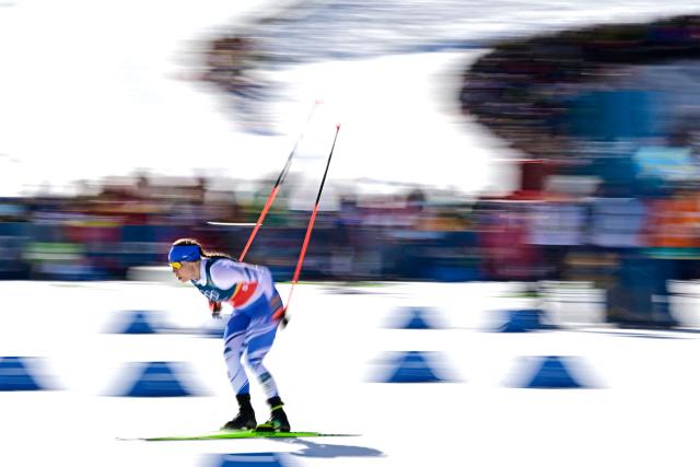 Finland's Jasmi Joensuu competes during the women's team cross country free sprint final event of the Milano Cortina 2026 Winter Olympic Games at Tesero Cross-Country Skiing Stadium in Lago di Tesero (Val di Fiemme), on February 18, 2026. (Photo by Tobias SCHWARZ / AFP)