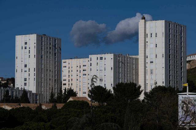 This photograph shows buildings at the La Bricarde neighbourhood in northern Marseille on February 17, 2026. (Photo by MIGUEL MEDINA / AFP)