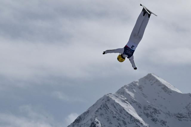 China's Kong Fanyu competes in the freestyle skiing women's aerials final 1 during the Milano Cortina 2026 Winter Olympic Games at Livigno Aerials & Moguls Park, in Livigno (Valtellina), on February 18, 2026. (Photo by Jeff PACHOUD / AFP)