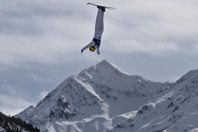 China's Kong Fanyu competes in the freestyle skiing women's aerials final 1 during the Milano Cortina 2026 Winter Olympic Games at Livigno Aerials & Moguls Park, in Livigno (Valtellina), on February 18, 2026. (Photo by Jeff PACHOUD / AFP)