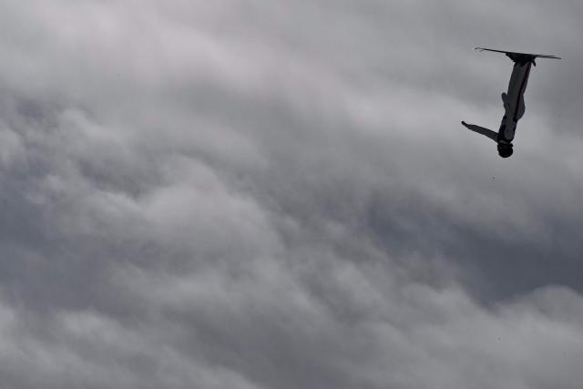 Canada's Marion Thenault competes in the freestyle skiing women's aerials final 1 during the Milano Cortina 2026 Winter Olympic Games at Livigno Aerials & Moguls Park, in Livigno (Valtellina), on February 18, 2026. (Photo by Jeff PACHOUD / AFP)