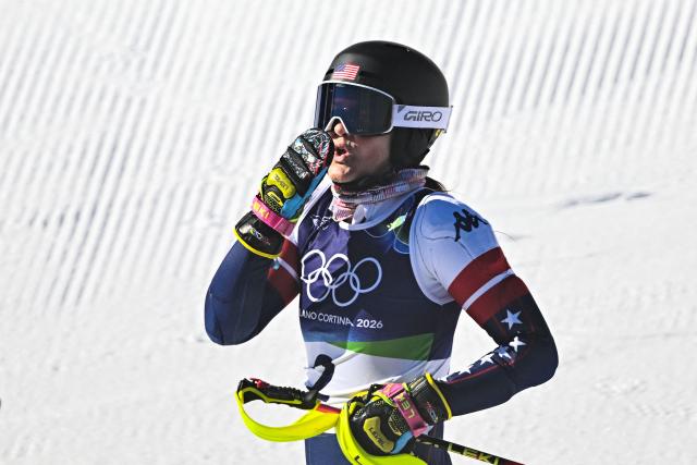 USA's Paula Moltzan reacts in the finish area after competing in the second run of the women's slalom event during the Milano Cortina 2026 Winter Olympic Games at the Tofane Alpine Skiing Centre in Cortina d’Ampezzo on February 18, 2026. (Photo by Tiziana FABI / AFP)