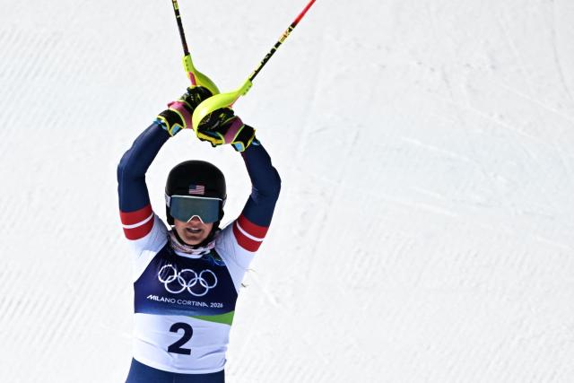 USA's Paula Moltzan reacts in the finish area after competing in the second run of the women's slalom event during the Milano Cortina 2026 Winter Olympic Games at the Tofane Alpine Skiing Centre in Cortina d’Ampezzo on February 18, 2026. (Photo by Tiziana FABI / AFP)