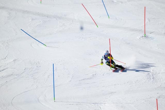 Australia's Madison Hoffman competes in the second run of the women's slalom event during the Milano Cortina 2026 Winter Olympic Games at the Tofane Alpine Skiing Centre in Cortina d’Ampezzo on February 18, 2026. (Photo by Marco BERTORELLO / AFP)