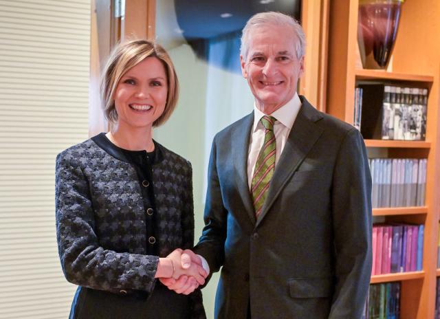 Iceland's Prime Minister Kristrun Mjoll Frostadottir (L) and Norway's Prime Minister Jonas Gahr Store shake hands in the prime minister's residence in Oslo, Norway on February 18, 2026.  (Photo by Annika Byrde / NTB / AFP) / Norway OUT
