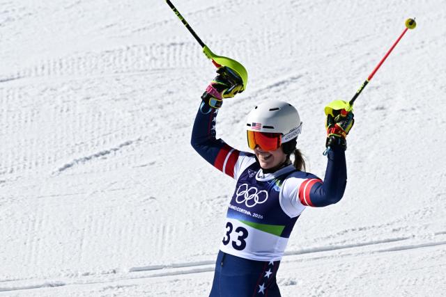 USA's A J Hurt reacts in the finish area after competing in the second run of the women's slalom event during the Milano Cortina 2026 Winter Olympic Games at the Tofane Alpine Skiing Centre in Cortina d’Ampezzo on February 18, 2026. (Photo by Tiziana FABI / AFP)