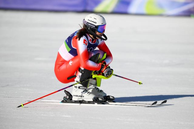 Switzerland's Wendy Holdener reacts in the finish area of the second run of the women's slalom event during the Milano Cortina 2026 Winter Olympic Games at the Tofane Alpine Skiing Centre in Cortina d’Ampezzo on February 18, 2026. (Photo by Marco BERTORELLO / AFP)