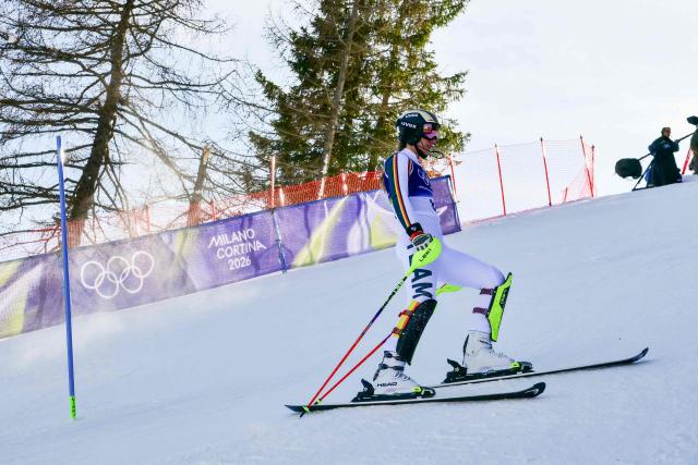 Germany's Lena Duerr skis out after missing a gate in the second run of the women's slalom event during the Milano Cortina 2026 Winter Olympic Games at the Tofane Alpine Skiing Centre in Cortina d’Ampezzo on February 18, 2026. (Photo by Stefano RELLANDINI / AFP)