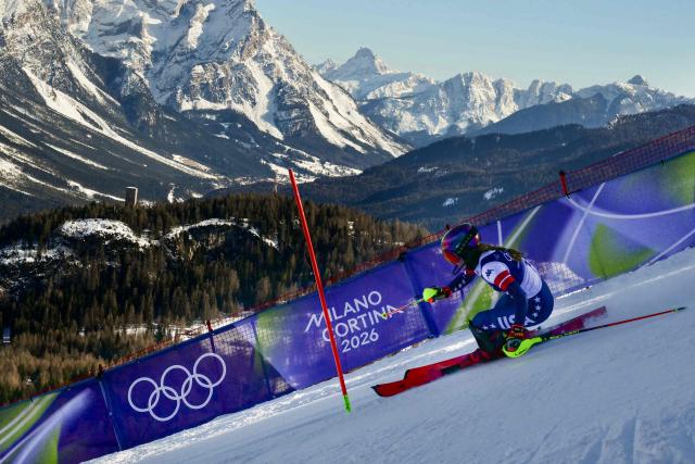 USA's Mikaela Shiffrin competes in the second run of the women's slalom event during the Milano Cortina 2026 Winter Olympic Games at the Tofane Alpine Skiing Centre in Cortina d’Ampezzo on February 18, 2026. (Photo by Stefano RELLANDINI / AFP)