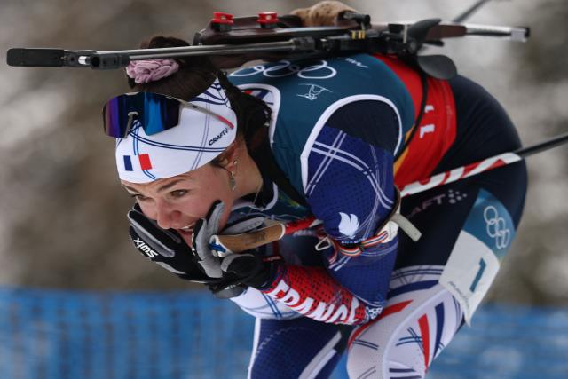 France's Camille Bened competes in the women's biathlon 4x6km relay event during the Milano Cortina 2026 Winter Olympic Games at the Anterselva Biathlon Arena (Sudtirol Arena) in Anterselva (Val Pusteria) on February 18, 2026. (Photo by FRANCK FIFE / AFP)