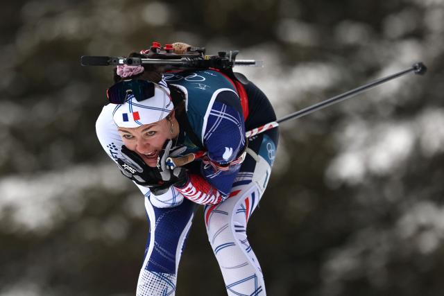 France's Camille Bened competes in the women's biathlon 4x6km relay event during the Milano Cortina 2026 Winter Olympic Games at the Anterselva Biathlon Arena (Sudtirol Arena) in Anterselva (Val Pusteria) on February 18, 2026. (Photo by FRANCK FIFE / AFP)