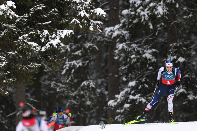 TOPSHOT - France's Camille Bened competes in the women's biathlon 4x6km relay event during the Milano Cortina 2026 Winter Olympic Games at the Anterselva Biathlon Arena (Sudtirol Arena) in Anterselva (Val Pusteria) on February 18, 2026. (Photo by FRANCK FIFE / AFP)