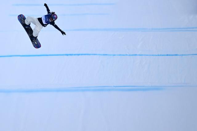 Japan's Kokomo Murase competes in the snowboard women's slopestyle final run 3 during the Milano Cortina 2026 Winter Olympic Games at Livigno Snow Park, in Livigno (Valtellina), on February 18, 2026. (Photo by Kirill KUDRYAVTSEV / AFP)