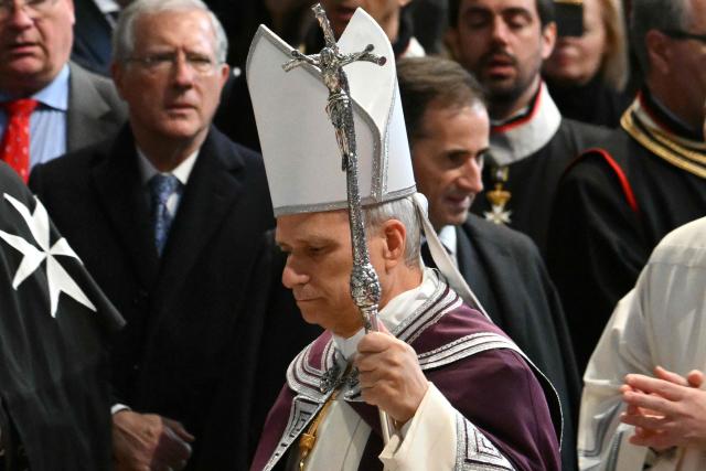 Pope Leo XIV attends a penitential procession before a holy mass on Ash Wednesday at the Basilica of Saint Sabina, on February 18, 2026. (Photo by Alberto PIZZOLI / AFP)