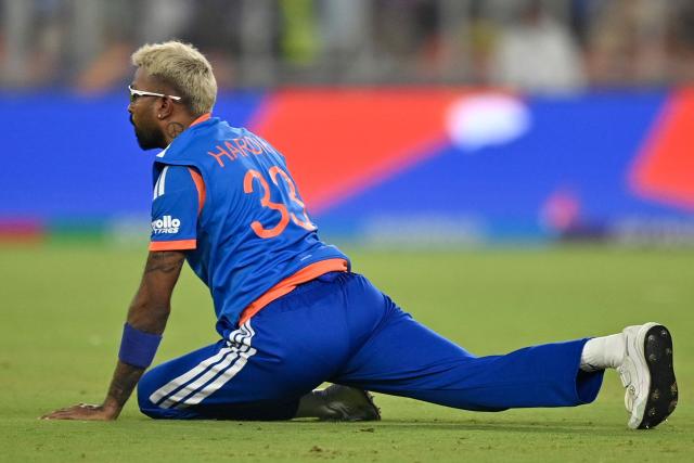 India's Hardik Pandya stretches as he fields during the 2026 ICC Men's T20 Cricket World Cup group stage match between India and Netherlands at the Narendra Modi Stadium in Ahmedabad on February 18, 2026. (Photo by Shammi MEHRA / AFP)
