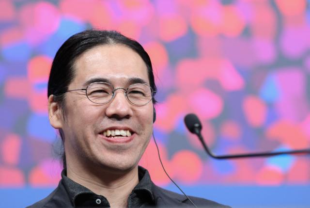 Japanese director Yoshitoshi Shinomiya attends a press conference for the film "A New Dawn" presented in competition at the 76th Berlinale, Europe's first major film festival of the year, in Berlin on February 18, 2026. (Photo by Ronny HARTMANN / AFP)