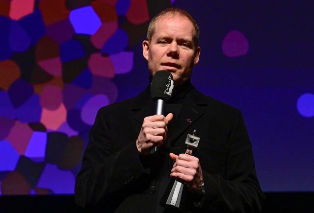 British composer Max Richter delivers a speech after being awarded with the Berlinale Camera award at the 76th Berlinale, Europe's first major film festival of the year, in Berlin on February 18, 2026. (Photo by John MACDOUGALL / AFP)