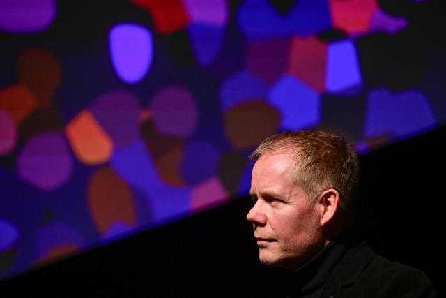British composer Max Richter listens during the Berlinale Camera award ceremony at the 76th Berlinale, Europe's first major film festival of the year, in Berlin on February 18, 2026. (Photo by John MACDOUGALL / AFP)