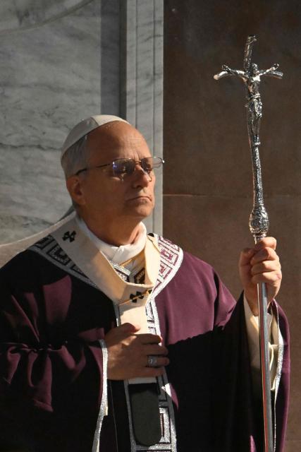 Pope Leo XIV leads a mass on Ash Wednesday at the Basilica of Saint Sabina, on February 18, 2026. (Photo by Alberto PIZZOLI / AFP)