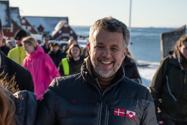 Denmark’s King Frederik X gets out of his car after a tour meeting with residents, in Nuuk, Greenland, on February 18, 2026. (Photo by Florent VERGNES / AFP)
