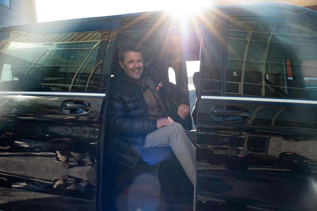Denmark’s King Frederik X gets out of his car after a tour meeting with residents, in Nuuk, Greenland, on February 18, 2026. (Photo by Florent VERGNES / AFP)