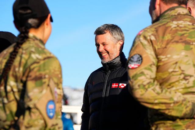Denmark's King Frederik X speaks with tropps as he visits Arctic Basic Training and Arctic Command in Nuuk, Greenland, on February 18, 2026. Denmark's King Frederik X arrived in Greenland for a three-day visit in a show of support for the autonomous Danish territory coveted by US President Donald Trump. (Photo by Bo Amstrup / Ritzau Scanpix / AFP) / Denmark OUT