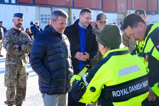 Denmark's King Frederik X and Greenland's Prime Minister Jens-Frederik Nielsen visit Arctic Basic Training and Arctic Command in Nuuk, Greenland, on February 18, 2026. Denmark's King Frederik X arrived in Greenland for a three-day visit in a show of support for the autonomous Danish territory coveted by US President Donald Trump. (Photo by Bo Amstrup / Ritzau Scanpix / AFP) / Denmark OUT